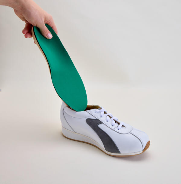 Inserting a Halo insole into a Halo shoe