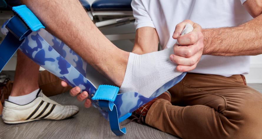 AFO-fitting-with-adult-hao-medical-orthotist Ankle-Foot Orthoses