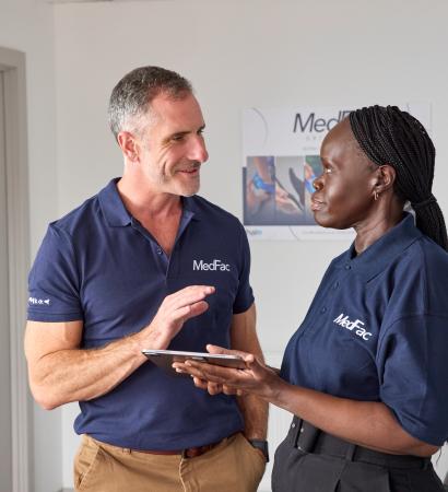 MedFac orthotists Two MedFac orthotists talking to each other NHS information
